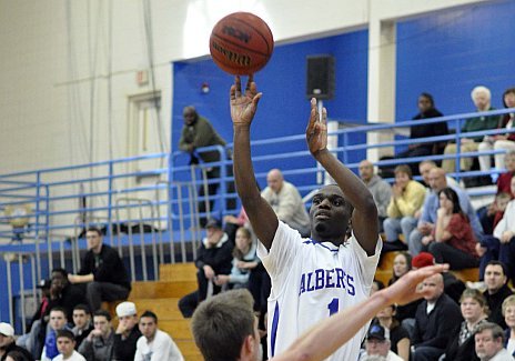 St. Juste Leads Falcons to Playoff Win Over Rivier 80-61