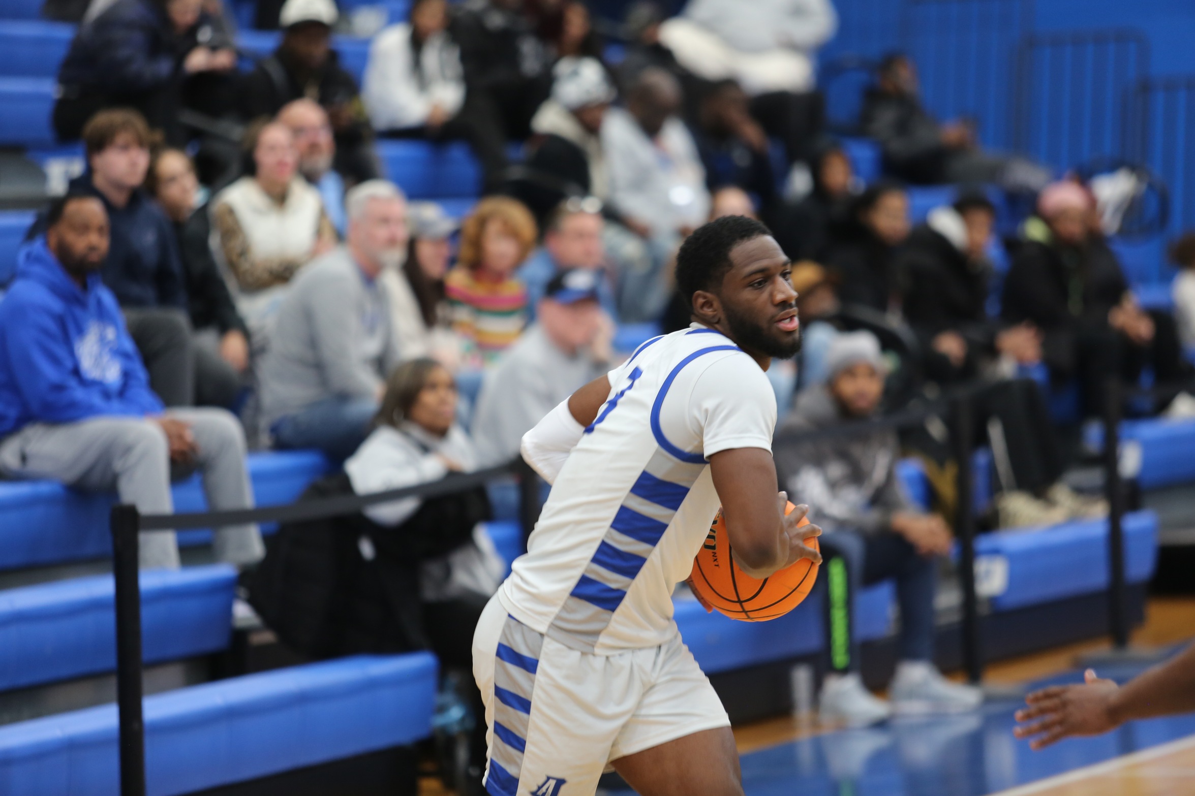 Second Half Surge Pushes Men's Basketball Past Lehman